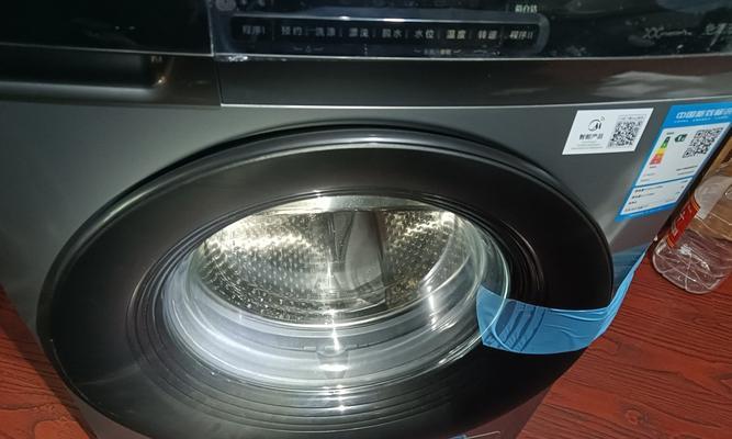 滚筒洗衣机桶壁破裂的修复方法（保护洗衣机桶壁健康）