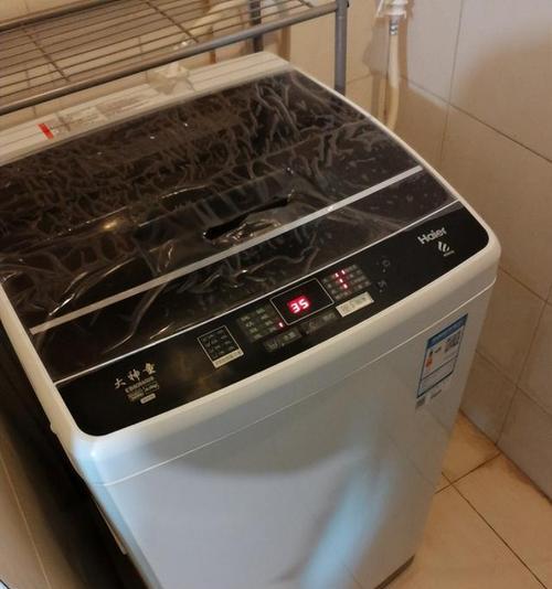 解决洗衣机排水固定不住的问题（教你轻松解决洗衣机排水不稳的困扰）