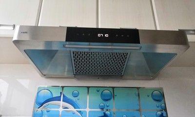 如何清洗油烟机的油烟（实用的清洗方法让你的厨房充满清新）