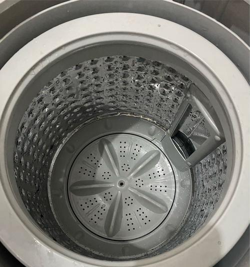 洗衣机投料盒拆卸清洗方法（轻松解决洗衣机投料盒的难题）